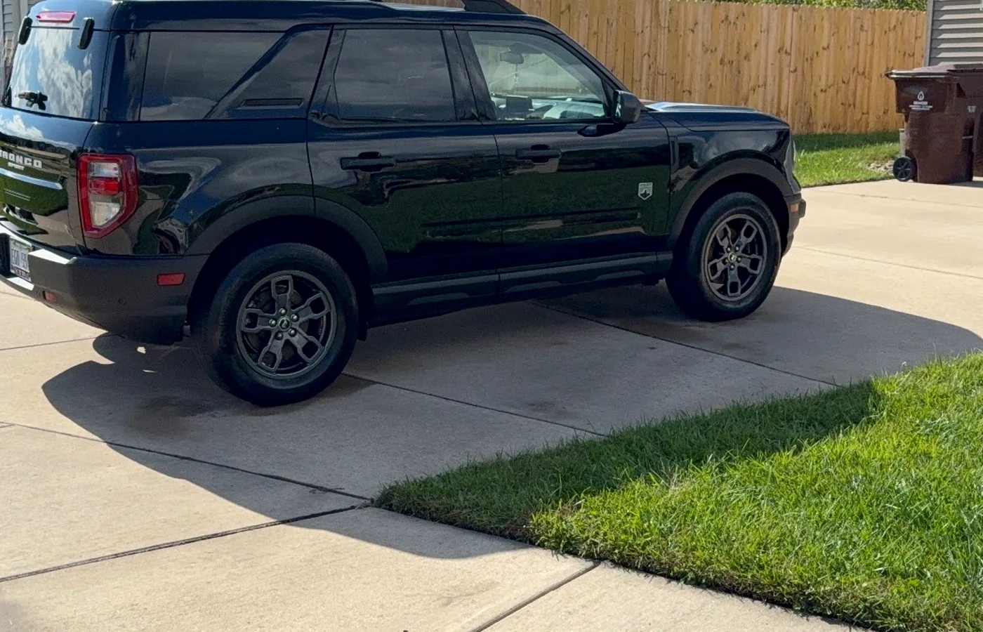 Shiny dark SUV after paint enhancement